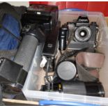 A Canon F-1 SLR camera 206979 with various accessories and lenses, a FD 28m 1:2.8, a cannon Zoom