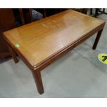 A Teak G-Plan rounded rectangular coffee table