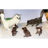 A Royal Doulton cat, a Beswick cat and three Beswick mice