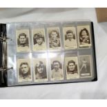 An album of 18 sheets of rarer cigarette cards