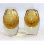 A pair of mid 20th century cased, Art Glass vases in the manner of Stromberg, in clear and amber