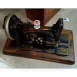 A vintage hand operated sewing machine