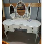 A period style kidney shaped dressing table in white