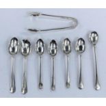 A pair of hallmarked silver sugar tongs, teaspoons etc.