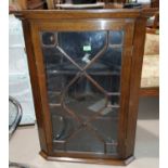 A 19th century oak straight front cupboard, enclosed by astral glazed door.