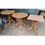 Three modern bentwood tables, two circle one square(bases slight a.f)