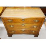 A good quality 20th century oak Georgian style chest of three drawers on bracket feet with canted