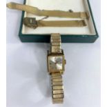 A vintage ladies Omega wristwatch with square dial on later expanding strap.