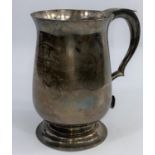 A Victorian 1 quart baluster mug on raised circular foot, with presentation inscription, London