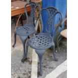 Two cast aliminium garden chairs