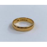 A 22 ct gold hallmarked wedding ring 5.1gm size N