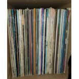 A selection of vintage pop and other records including Abba, ELO, Elvis etc