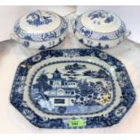 A Chinese blue and white ceramic rectangular dish with canted corners, decorated with traditional