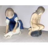 A Royal Copenhagen ceramic figure: girl sat on rock, No 4027, height 14.5 cm; another (a.f.); a