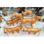 A Beswick pride of lions one male, two females and three cubs