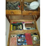 A 20th century oak tool cabinet/collector's cabinet with removable front, two short and two long