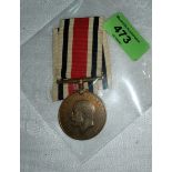 A GV Police Long Service medal to Raymond Weaver