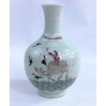 A Chinese squat globular vase with detailed decoration of man on ox and a couple on clouds with