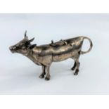 a 19th century continental white metal cow creamer, unmarked, length 14cm