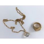 A 9ct gold chain with faceted crystal glass ball pendant gross weight 7.2 gms and a brass gents
