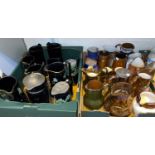 A selection of Victorian black glazed jugs and a selection of copper lustre jugs