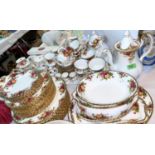A large Royal Albert 'Old Country Roses' dinner and tea service which includes serving dishes,
