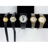 A ladies omega stainless steel wrist watch; a modern Mickey Mouse wrist watch and three other ladies