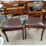 A Regency Halequin set of 4 dining chairs with wide top rails and drop-in seats, on sabre legs