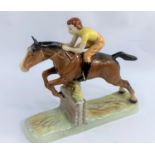 A Beswick group of girl on jumping horse 939, length 26cm (tail restored)