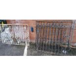 A pair of cast metal gates, another pair of cast metal gates, similar metal fencing