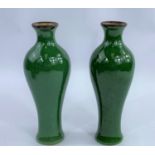 A pair of Chinese monochrome green crackle glaze high shoulder baluster vases, the rim unglazed,