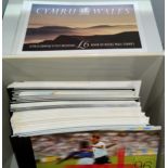 GB: a collection of over 40 QEII commemorative stamp books (priced £4, £5 and £6)