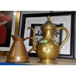 A Middle Eastern brass tea pot and a conical copper jug