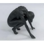 A Royal Doulton 'Nude F2' ceramic figure of crouched nude woman black matt design HN5071