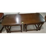 An Ercol nest of 3 occasional tables comprising of a coffee table and 2 smaller tables