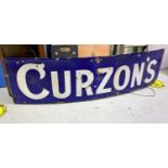 A rectangular early 20th century enamel sign, lettered "Curzon's", in white against a blue ground,