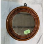 A 19th century plain circular mirror in solid mahogany frame, 22cm diameter