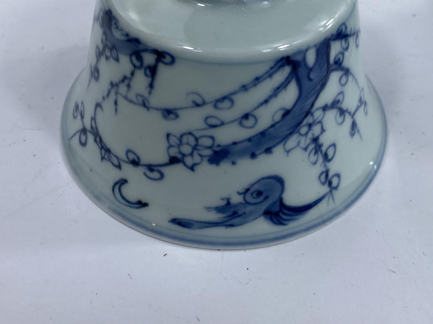 Four Chinese blue and white tea bowls with Prunus blossom decoration with birds, a character mark to - Image 4 of 4