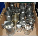 A collection of various pewter tankards etc
