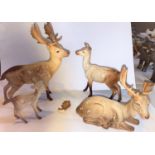 A group of Beswick stags two with antlers 1 A.F a doe and a fawn