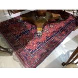 A hand knotted 20th century Persian style rug 190 x 126cm