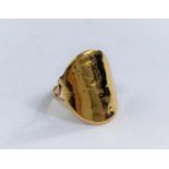 A ring formed from a George V half sovereign on soldered shank st 9ct, 4gm gross (shank split)size K