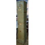 A vintage grey metal upright storage locker, H183 x W30 cm