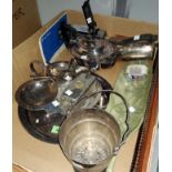 A circular silver plated tray and a selection of silver plated items, teapot, hotwater jug, a