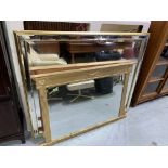 A gilt framed traditional style rectangular over mantel mirror, size 59x86cm; another large modern