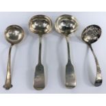 A hallmarked silver pair of Old English pattern sauce ladles, monogrammed, Exeter 1842; another