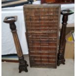 Two printers trays and a pair of wooden candlesticks, 75cm