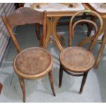A bentwood kitchen chair with poker work solid seat and another similar