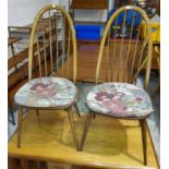 An Ercol set of 4 dining chairs with hoop and stick backs