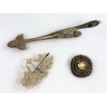 A 19th century continental paste brooch, a seed pearl brooch (a/f), contintental grape tongs